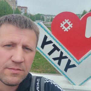 николай